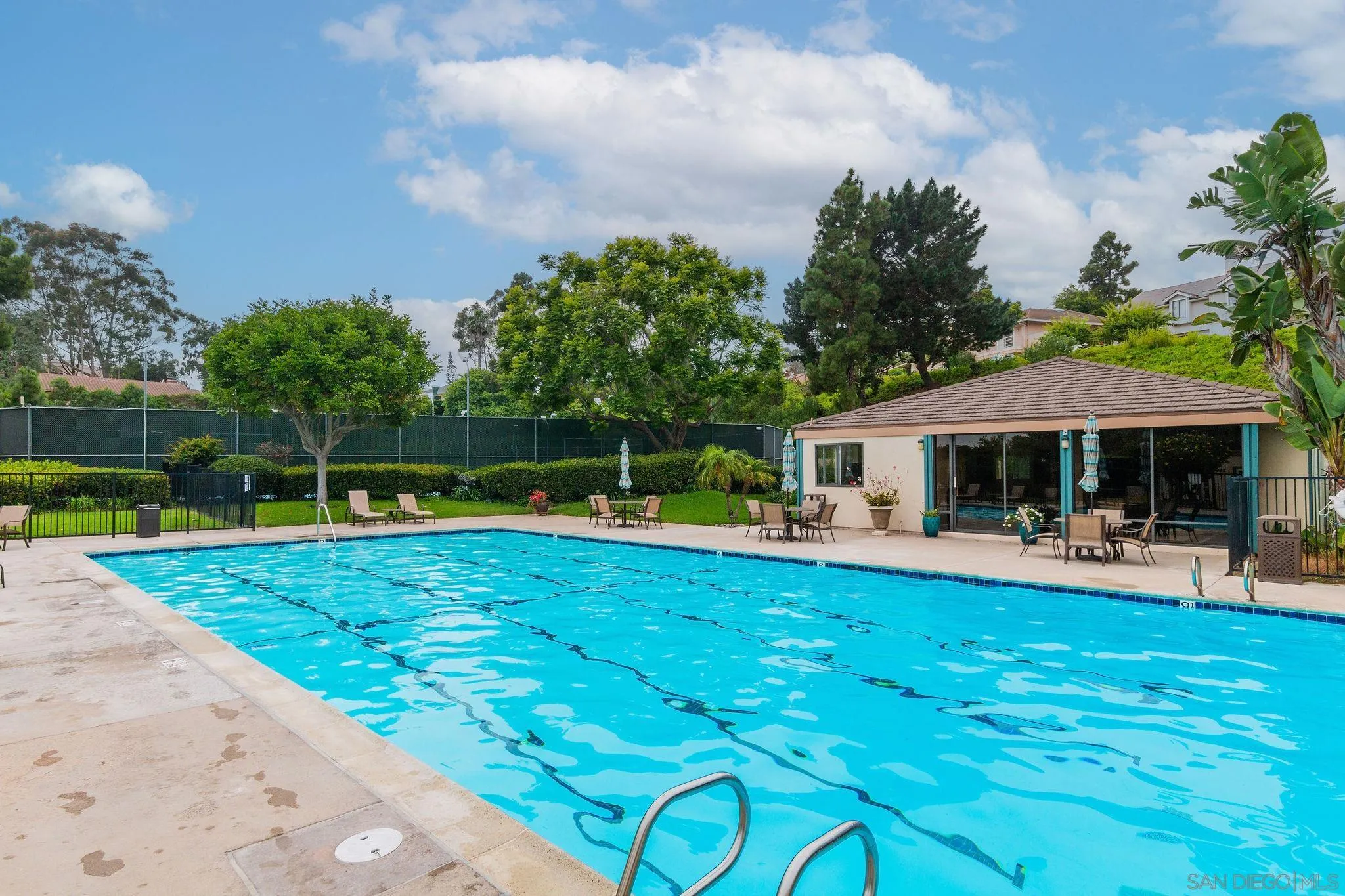 1863 Caminito Quintero La Jolla, CA 92037 - Photo 24 of 27 a view of a house with swimming pool and a yard