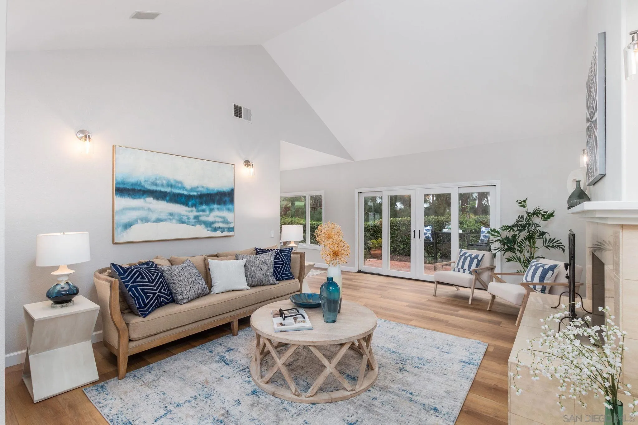 1863 Caminito Quintero La Jolla, CA 92037 - Photo 4 of 27 a living room with furniture and a large window