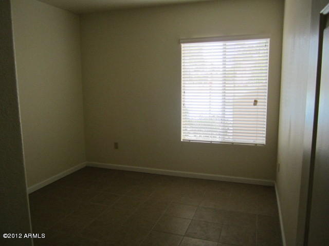 1825 West Ray Road, Unit 1110 Chandler, AZ 85224 - Photo 6 of 9 a view of a room that has a window in it