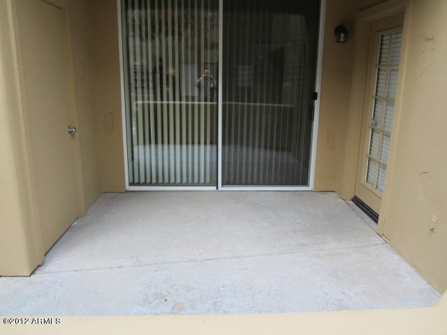1825 West Ray Road, Unit 1110 Chandler, AZ 85224 - Photo 7 of 9 a view of a garage