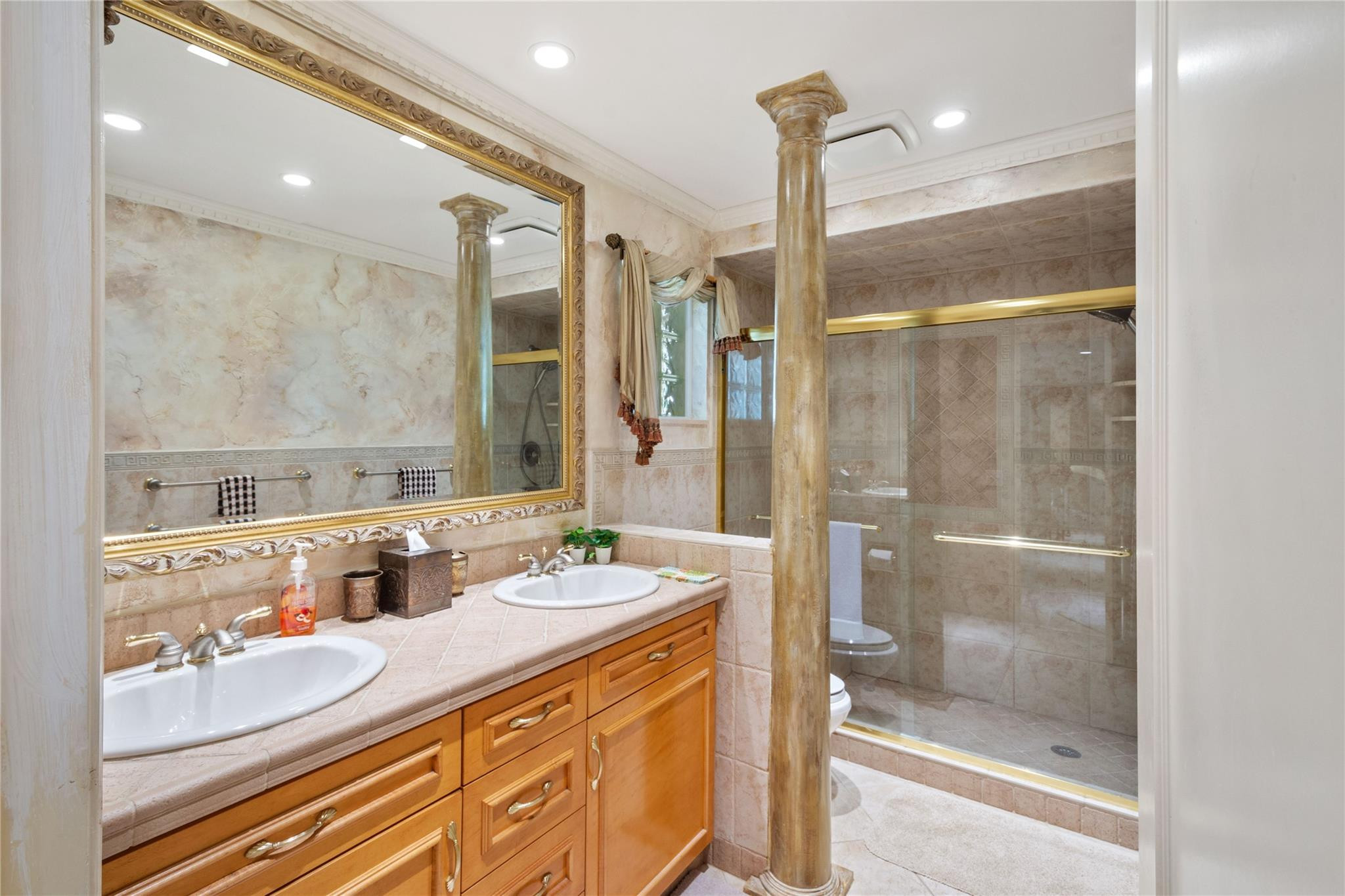 6832 Viento Way Boca Raton, FL 33433 - Photo 14 of 31 a bathroom with a double vanity sink mirror and shower