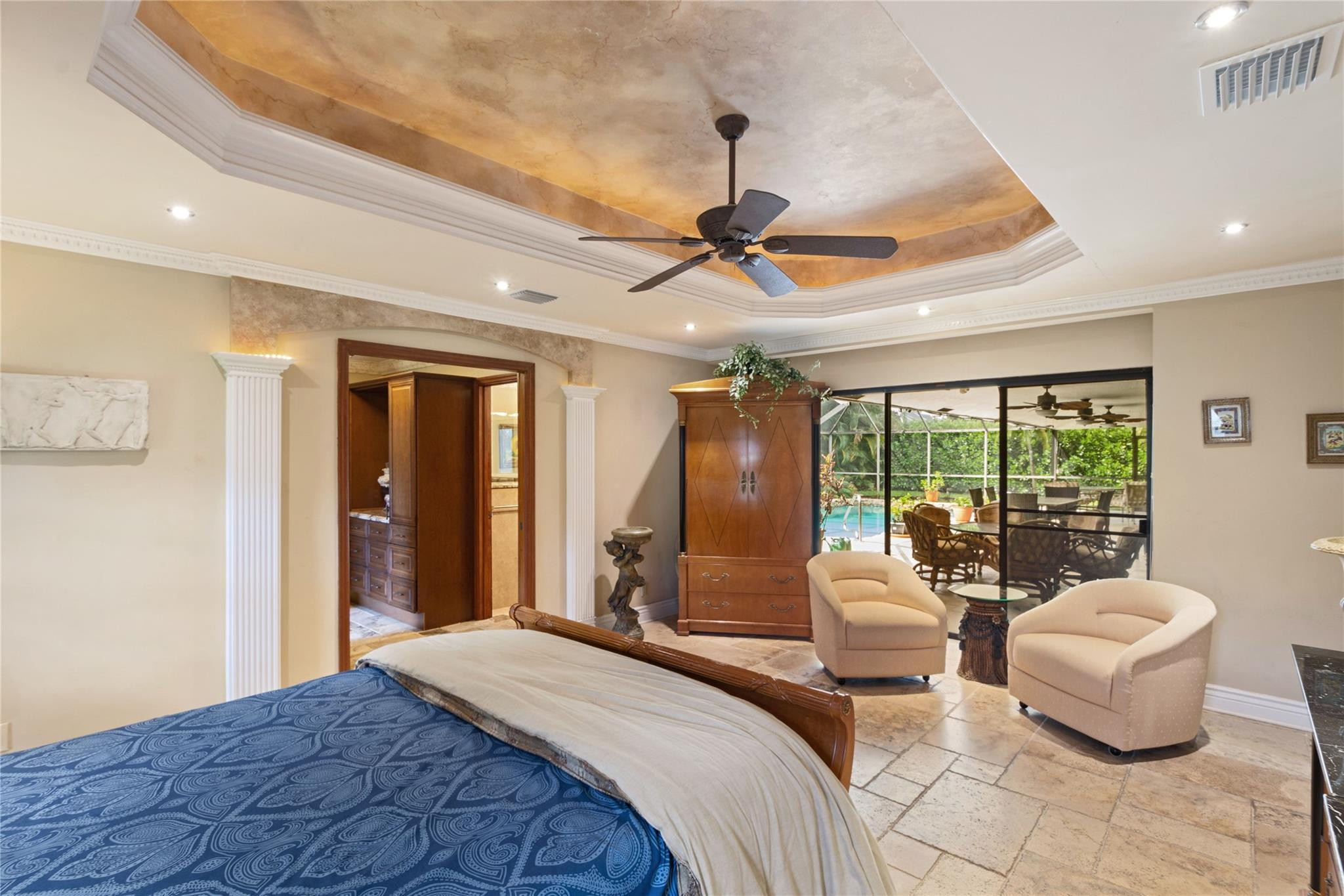 6832 Viento Way Boca Raton, FL 33433 - Photo 24 of 31 a bedroom with a bed and large windows
