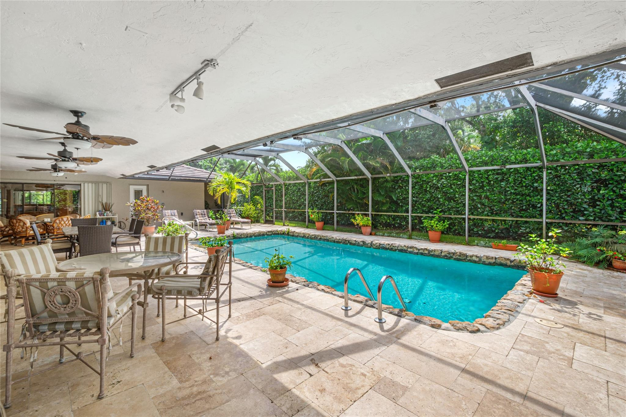 6832 Viento Way Boca Raton, FL 33433 - Photo 27 of 31 a view of swimming pool with outdoor seating and a porch