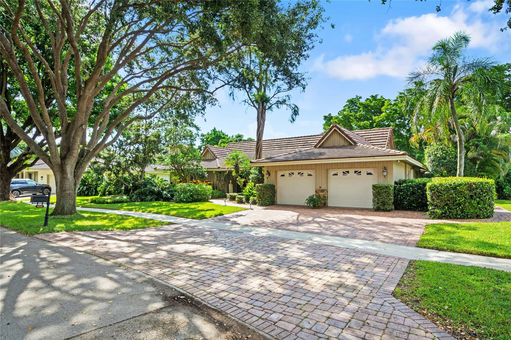 6832 Viento Way Boca Raton, FL 33433 - Photo 31 of 31 a front view of a house with a yard and garage