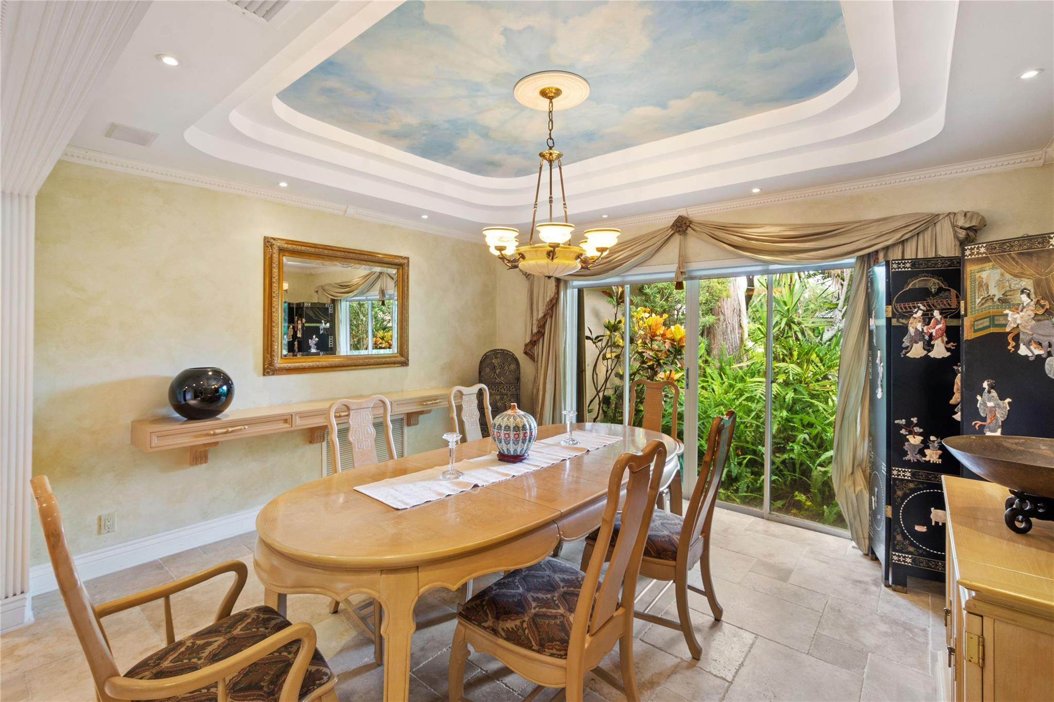 6832 Viento Way Boca Raton, FL 33433 - Photo 10 of 31 a view of a dining room with furniture wooden floor and chandelier