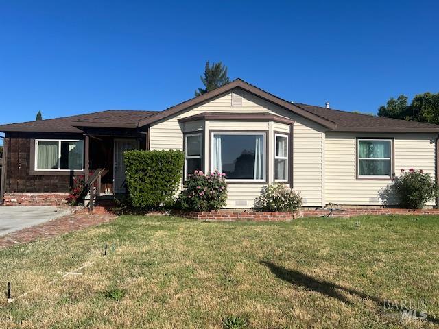 3 Bedroom -1 1/2 Bath. Hardwood floors, Bathroom has been updated, New windows, Large back yard, Extra room with wood burning fireplace.