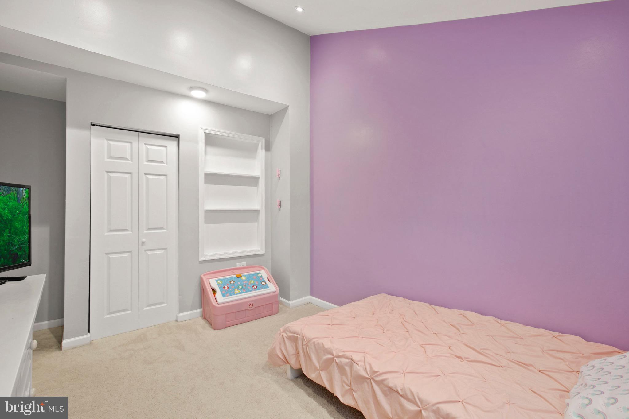 8054 Wallace Road Dundalk, MD 21222 - Photo 25 of 31 Bedroom #2 with built in bookshelves