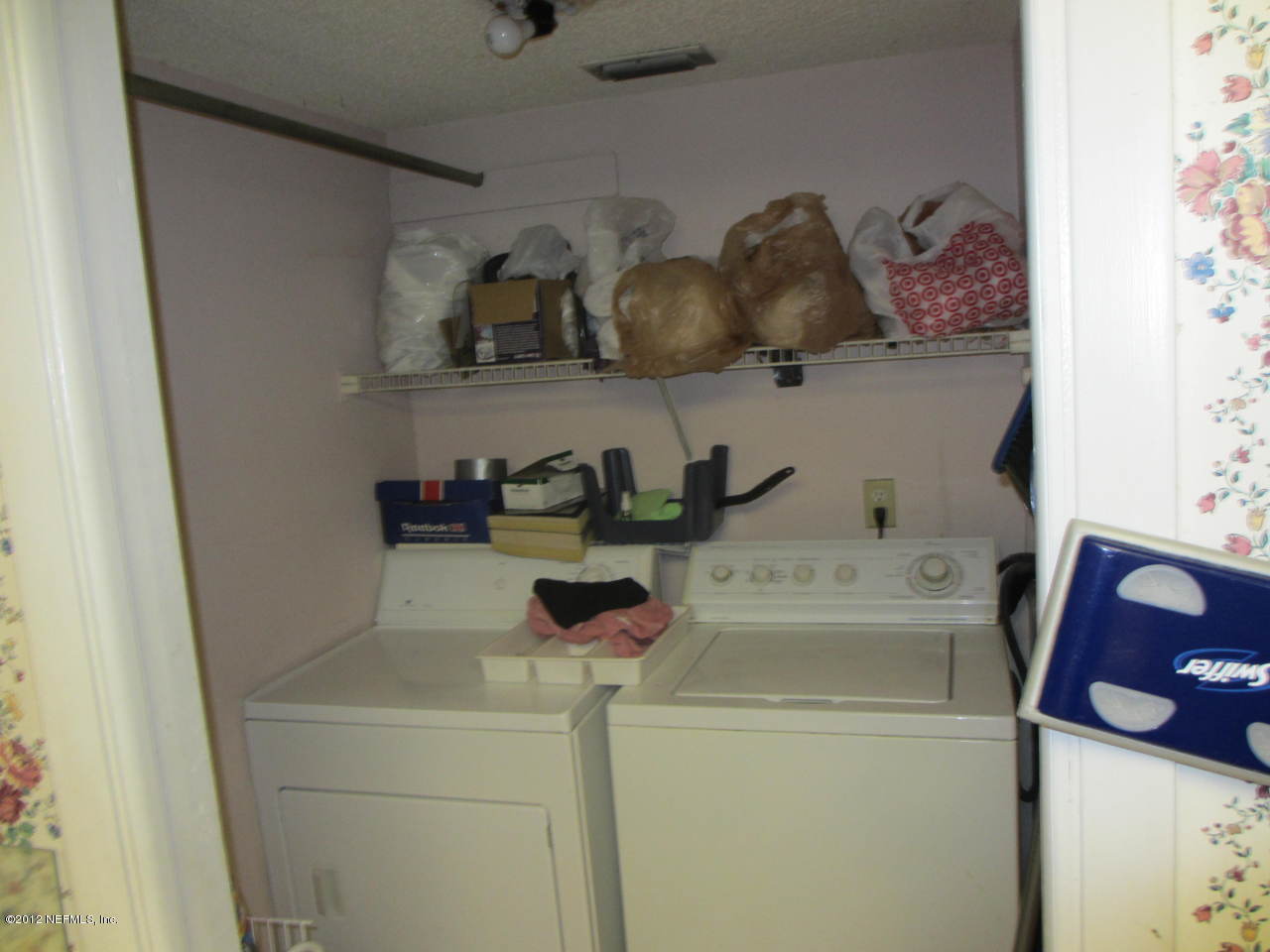1303 Kettering Way Orange Park, FL 32073 - Photo 13 of 24 a utility room with dryer and washer