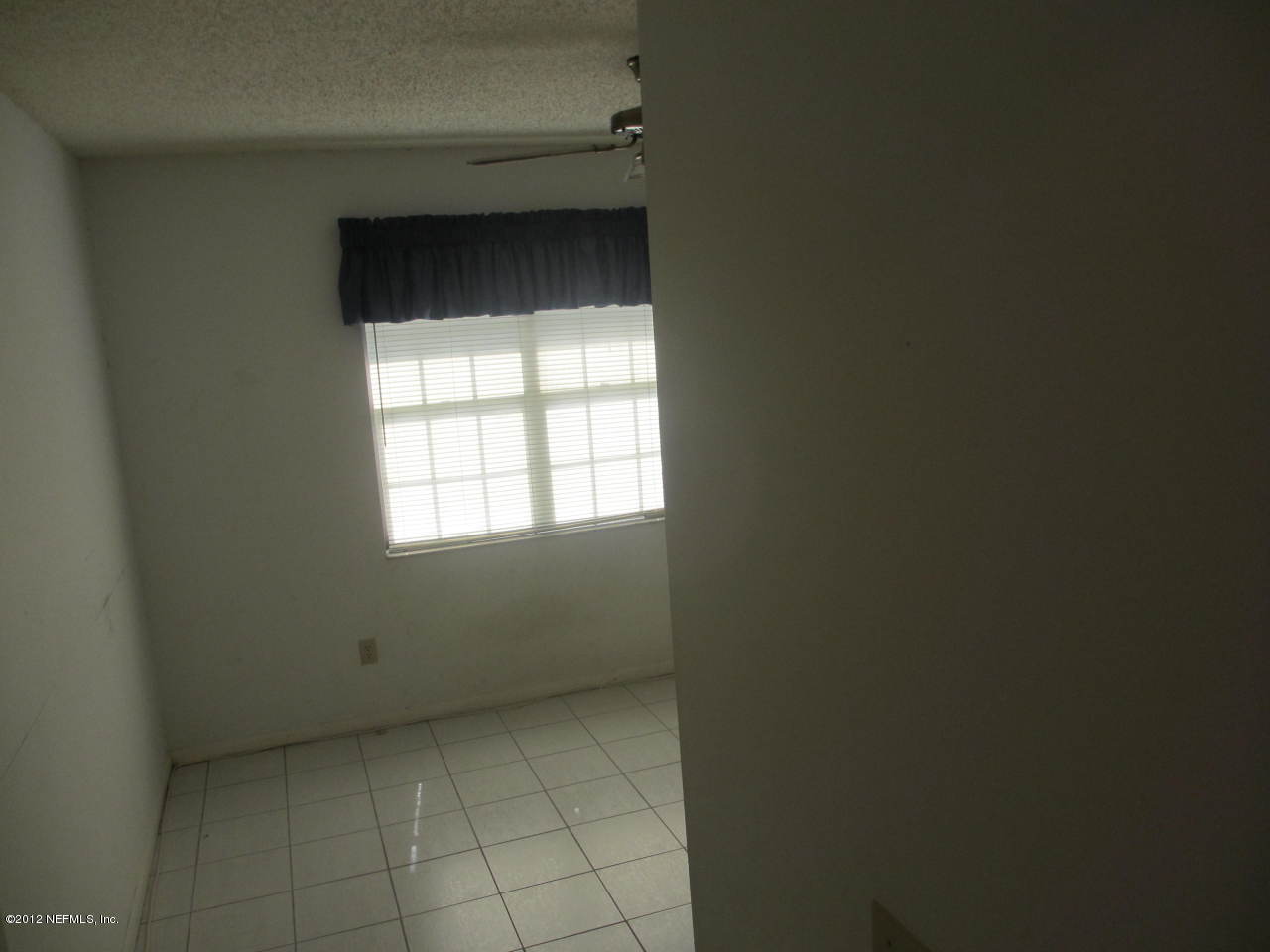 1303 Kettering Way Orange Park, FL 32073 - Photo 17 of 24 a view of a small space with a window