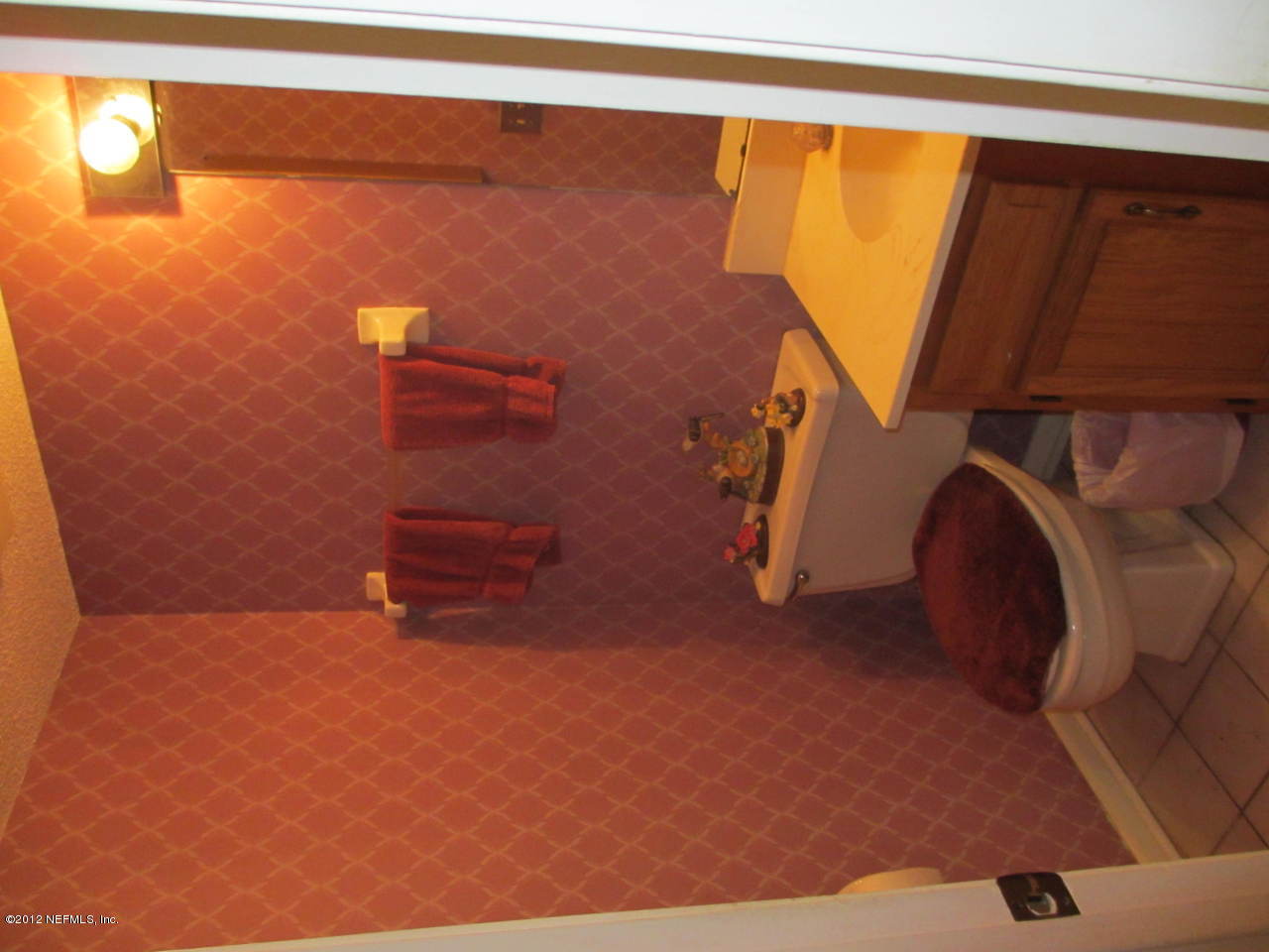 1303 Kettering Way Orange Park, FL 32073 - Photo 5 of 24 a view of walk in closet with clothes and shoes