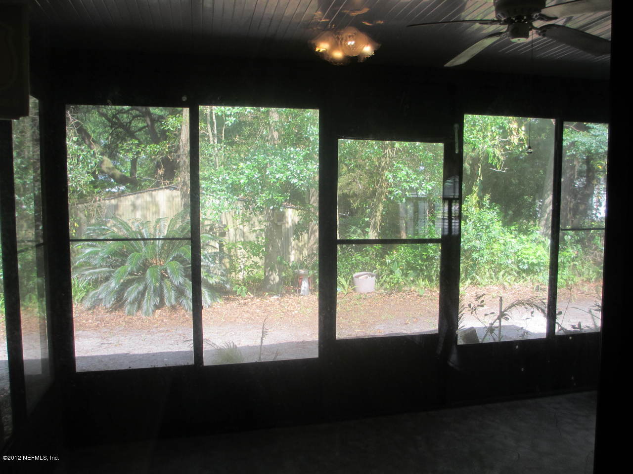 1303 Kettering Way Orange Park, FL 32073 - Photo 9 of 24 a view of an empty room with a large window