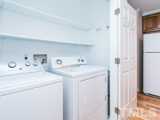 7201 Cedric Drive Raleigh, NC 27603 - Photo 21 of 25 a utility room with dryer and washer