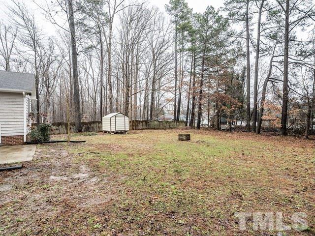 7201 Cedric Drive Raleigh, NC 27603 - Photo 22 of 25 a view of outdoor space with trees