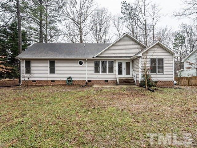 7201 Cedric Drive Raleigh, NC 27603 - Photo 24 of 25 front view of a house with a yard