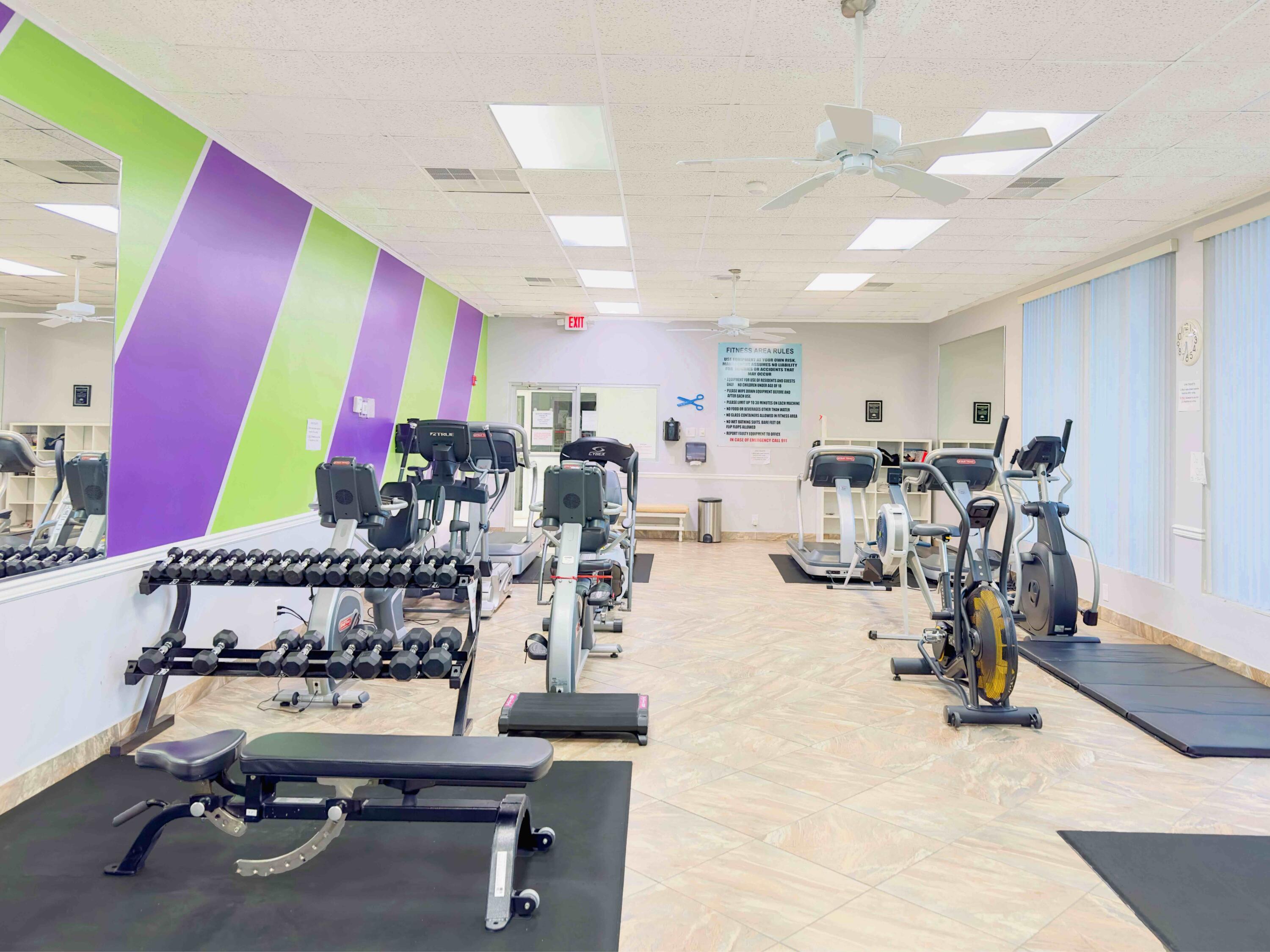 2019 Southwest 18th Drive Boynton Beach, FL 33426 - Photo 13 of 17 a room with lots of chairs and mirrors