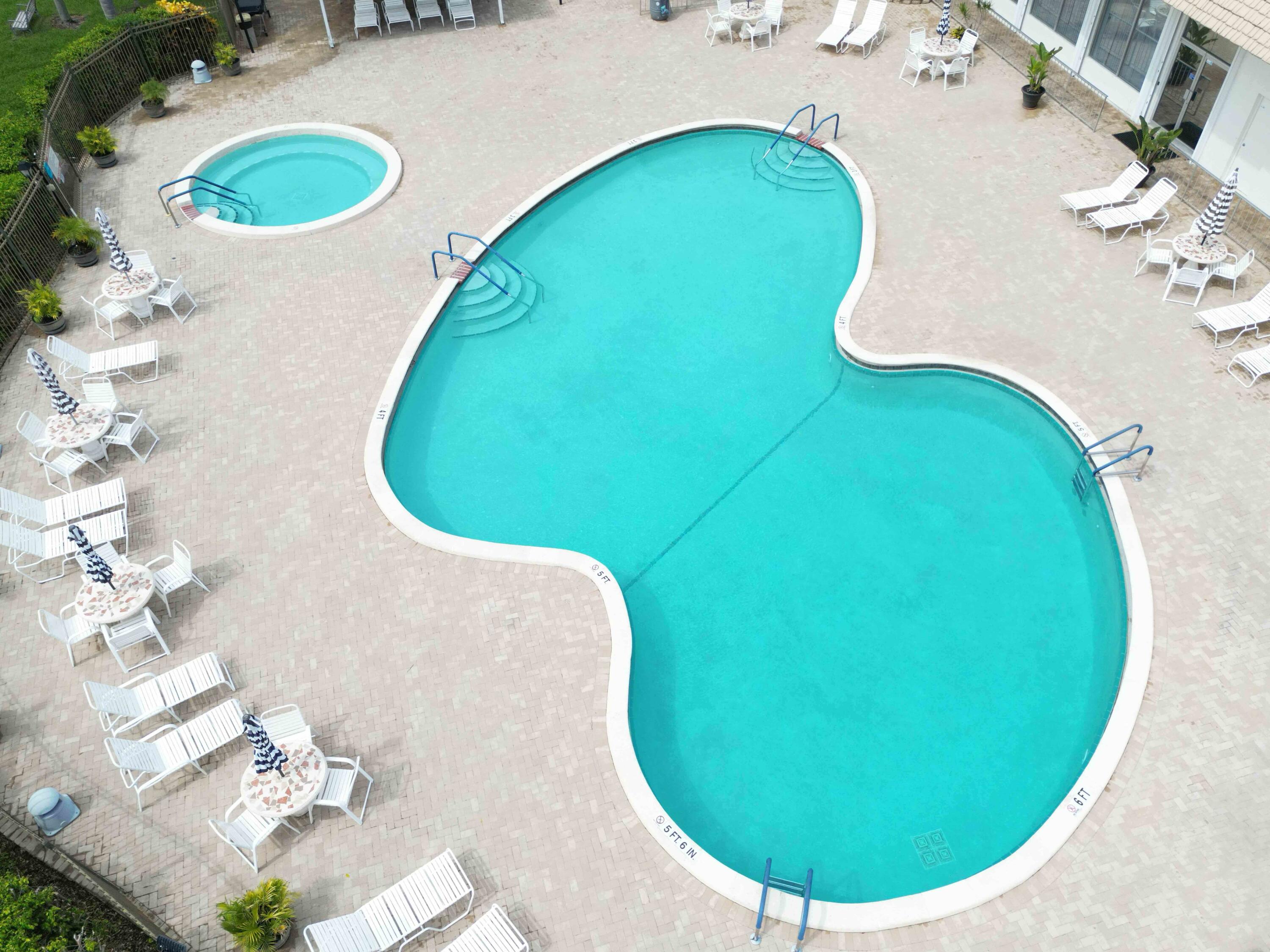 2019 Southwest 18th Drive Boynton Beach, FL 33426 - Photo 16 of 17 an aerial view of a swimming pool