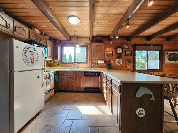 a dining room with furniture and a clock