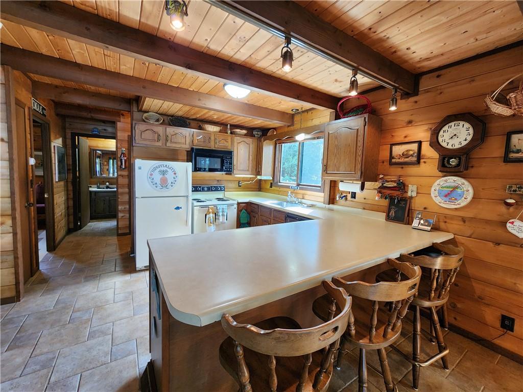 374 Latonka Drive Mercer, PA 16137 - Photo 25 of 50 a dining room with furniture and a clock