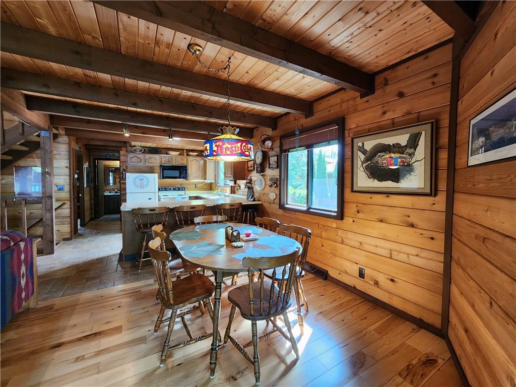 374 Latonka Drive Mercer, PA 16137 - Photo 30 of 50 a dining room with furniture and wooden floor