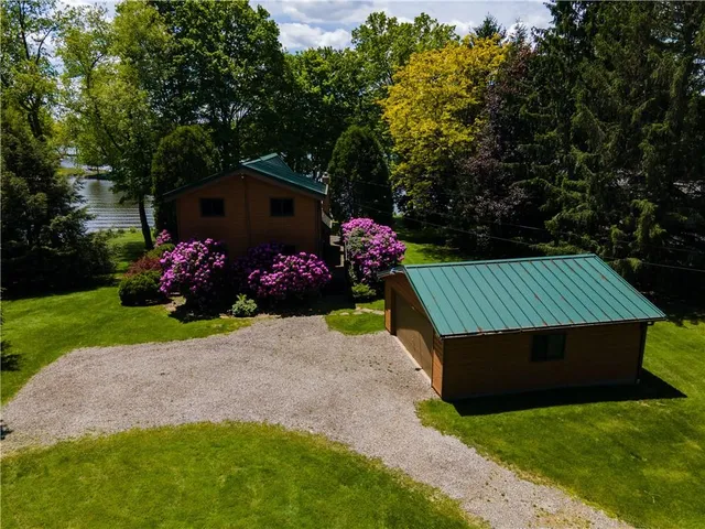 a view of backyard with garden and flowers