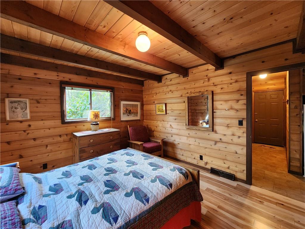 374 Latonka Drive Mercer, PA 16137 - Photo 38 of 50 a bedroom with a bed and wooden floor