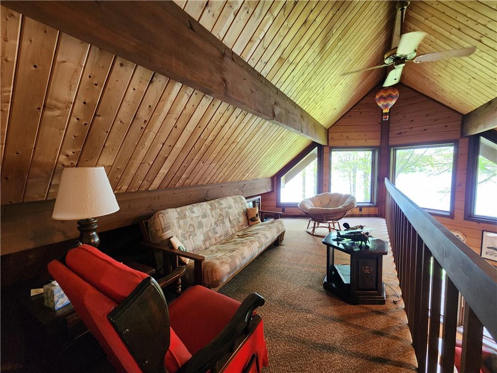 374 Latonka Drive Mercer, PA 16137 - Photo 40 of 50 a living room with furniture a rug and a potted plant