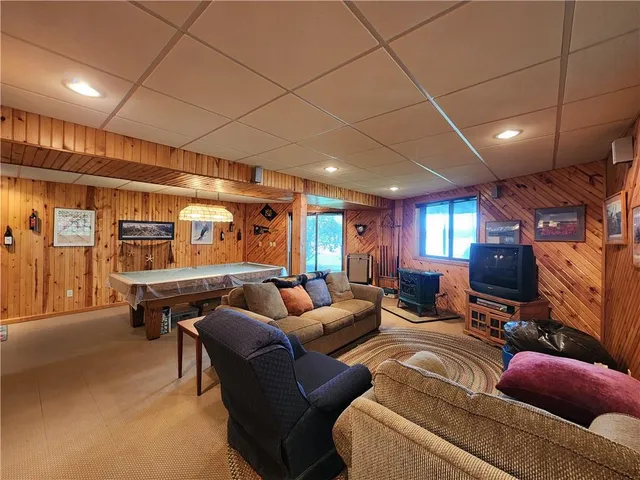a kitchen with stainless steel appliances granite countertop a refrigerator and a stove