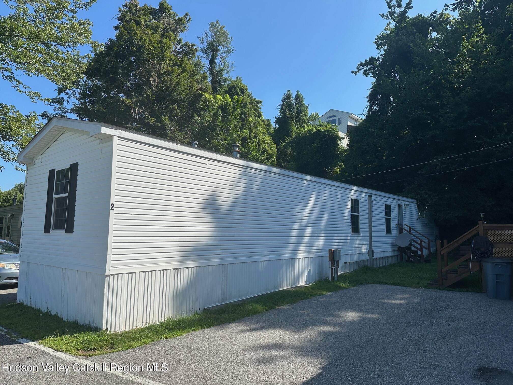 2699 Highway 22, Unit 2 Patterson, NY 12563 - Photo 1 of 11 a view of a house with a yard