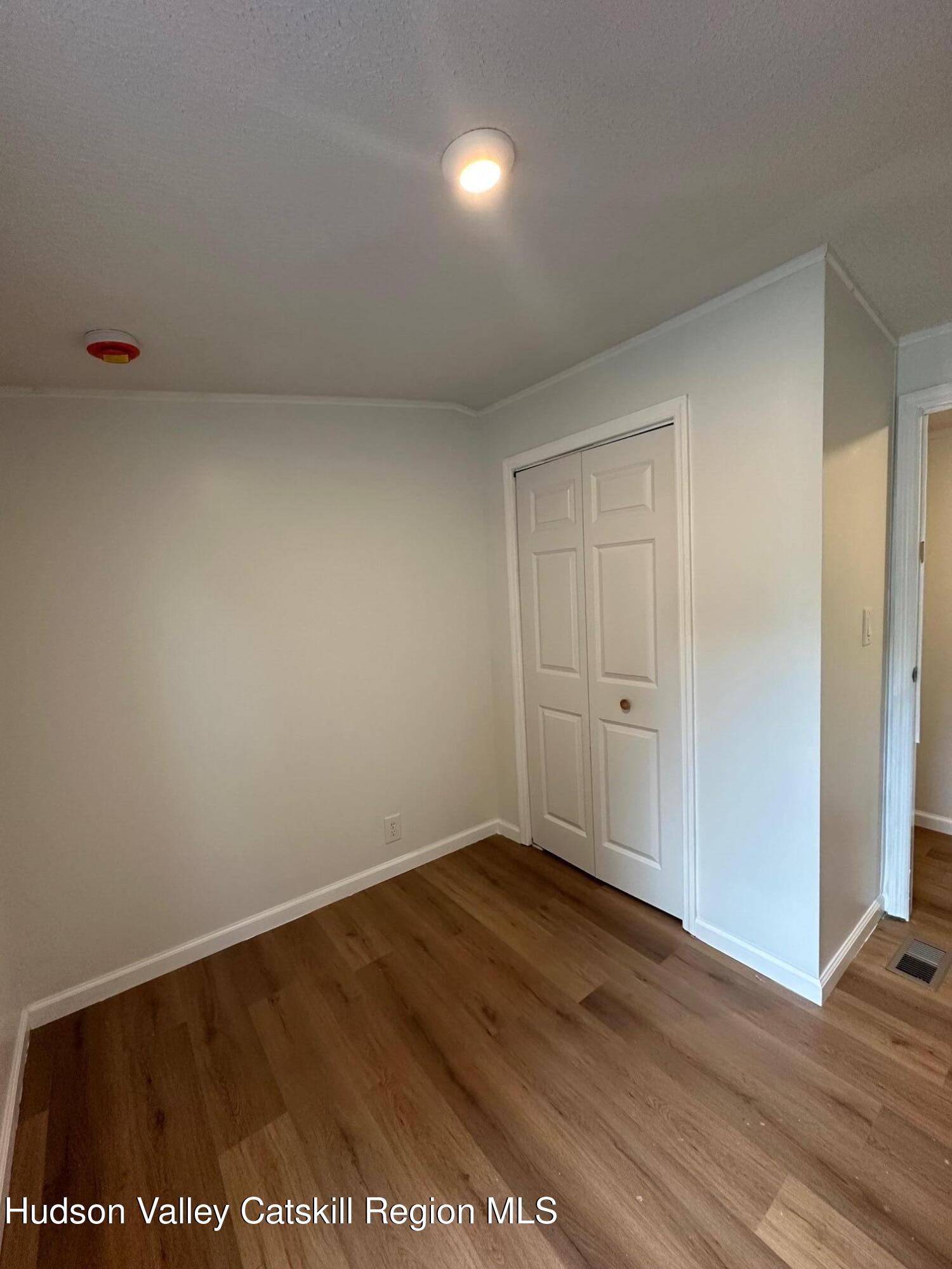 2699 Highway 22, Unit 2 Patterson, NY 12563 - Photo 9 of 11 a view of an empty room and window