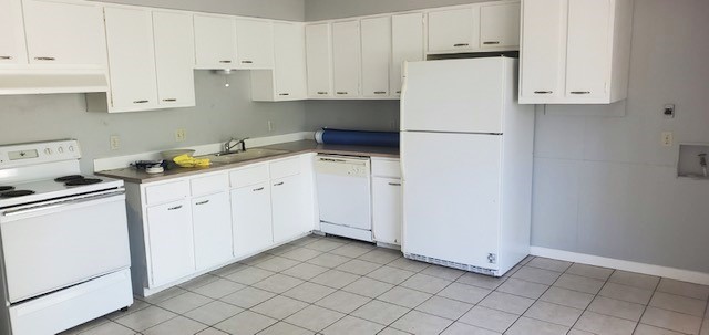 3111 Fritz Hughes Park Road Austin, TX 78732 - Photo 2 of 11 a kitchen with cabinets and appliances