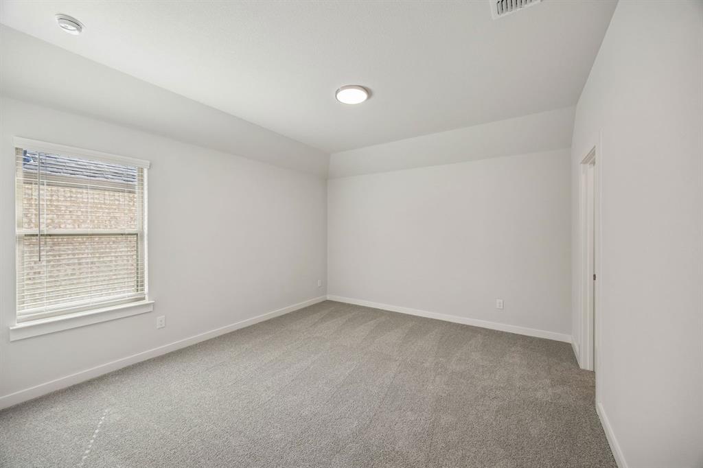 1461 Companero Street Haslet, TX 76052 - Photo 26 of 35 an empty room with a window