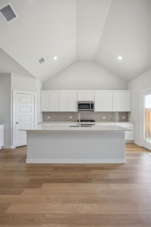 1461 Companero Street Haslet, TX 76052 - Photo 9 of 35 a view of kitchen with stainless steel appliances cabinets
