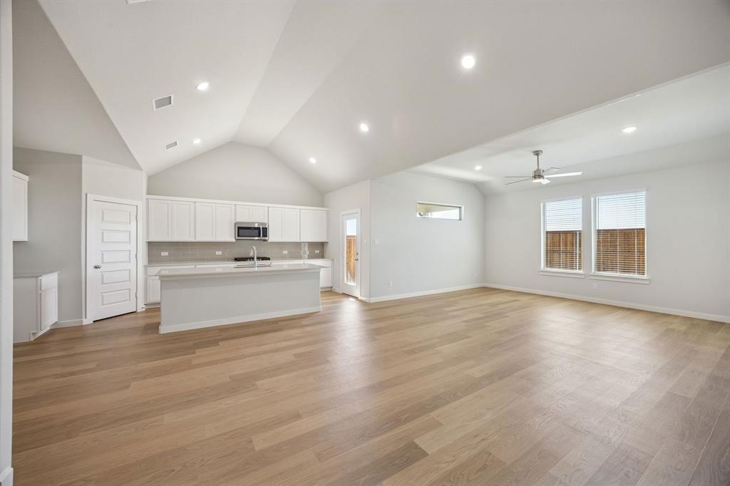 1461 Companero Street Haslet, TX 76052 - Photo 34 of 35 a view of kitchen with wooden floor