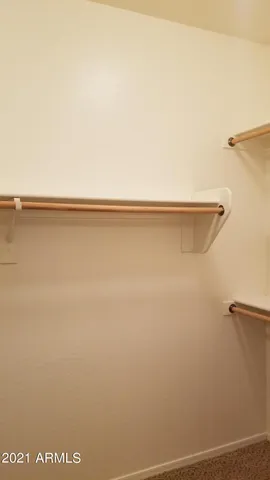 a view of a room with racks on the wall