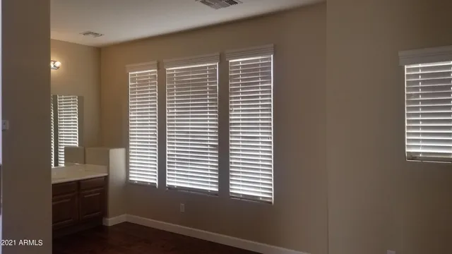 a view of a bedroom with a window