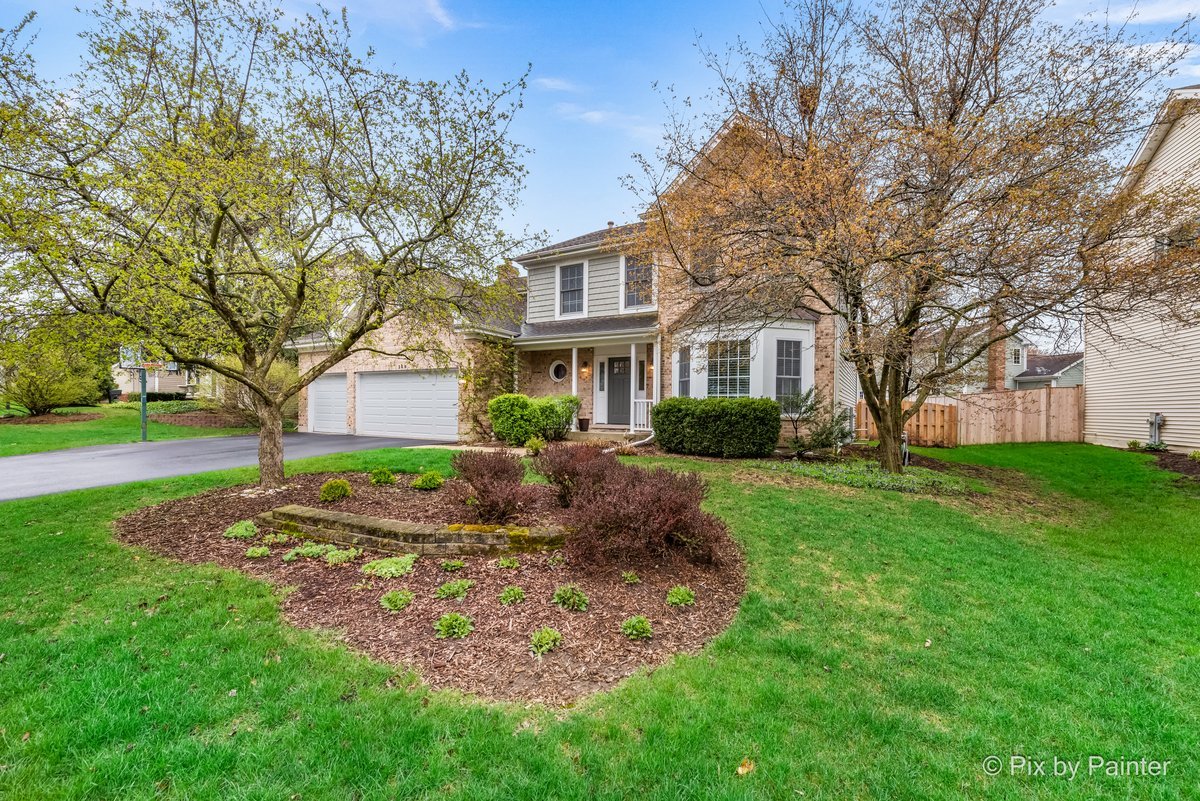 249 Adare Drive Cary, IL 60013 - Photo 1 of 36 a front view of a house with garden