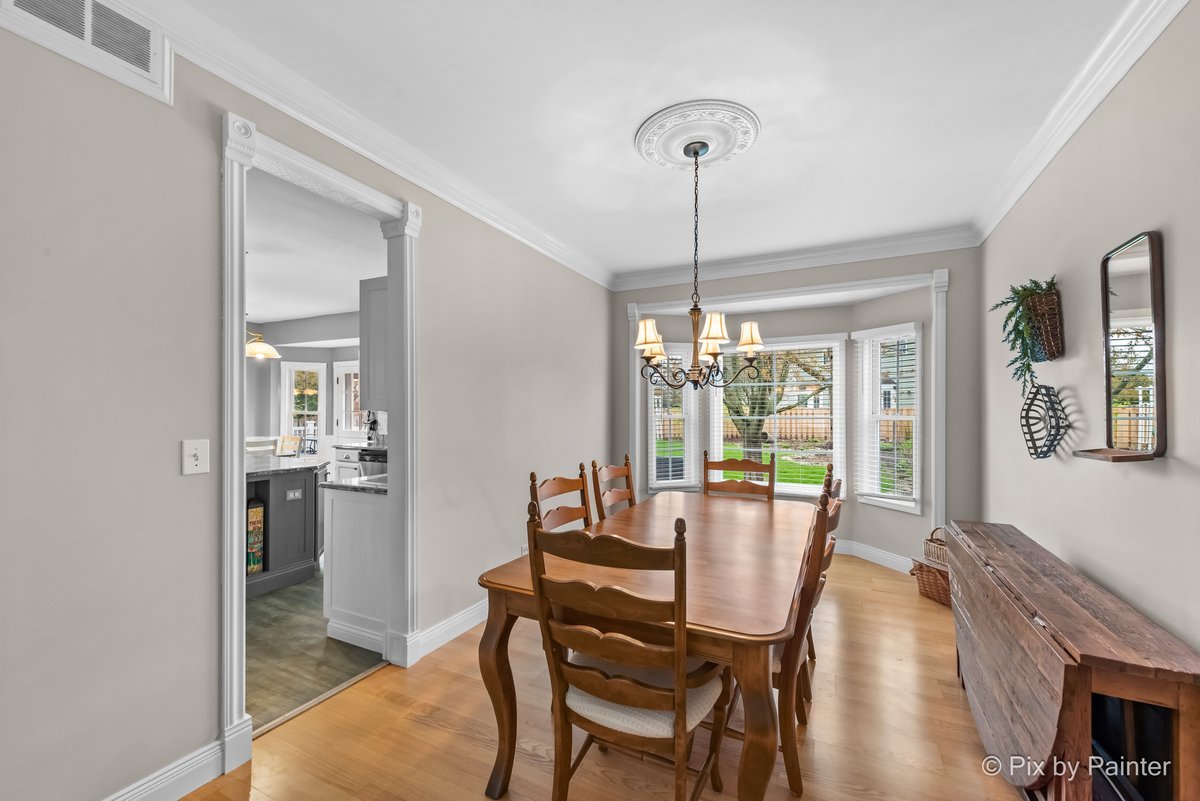 249 Adare Drive Cary, IL 60013 - Photo 14 of 36 a view of a dining room with furniture window and outside view