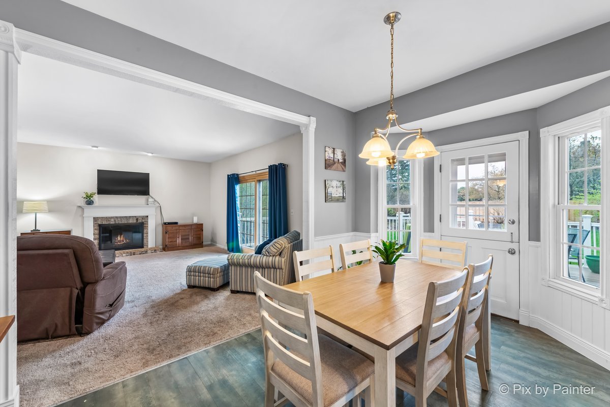 249 Adare Drive Cary, IL 60013 - Photo 19 of 36 a view of a dining room with furniture window and outside view