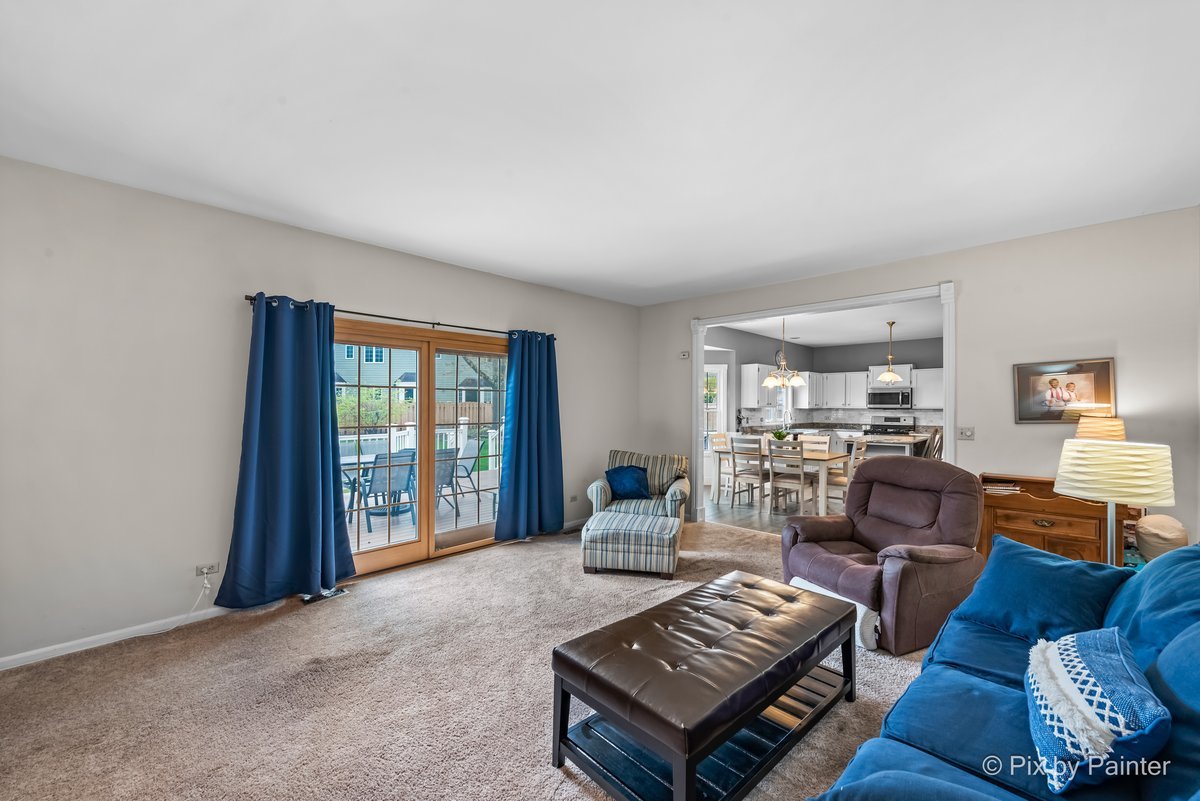 249 Adare Drive Cary, IL 60013 - Photo 23 of 36 a living room with furniture and a window