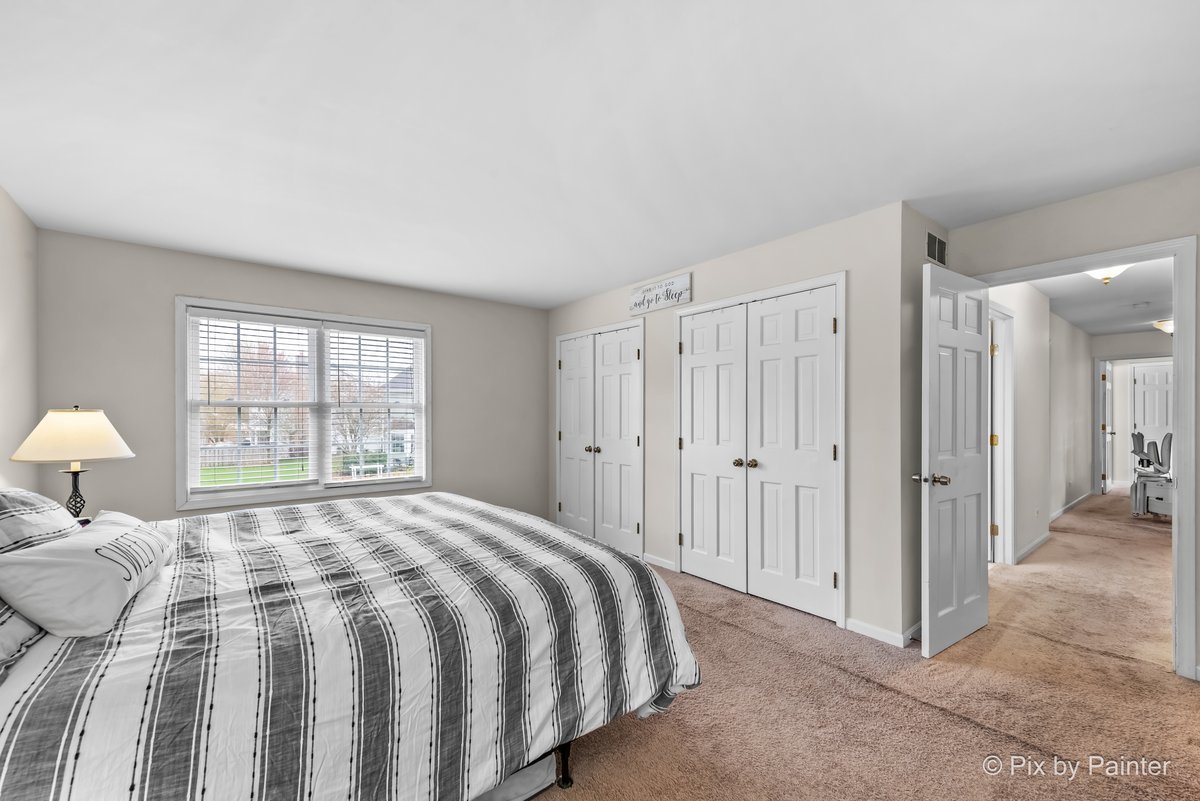 249 Adare Drive Cary, IL 60013 - Photo 30 of 36 a bedroom with a bed and a window