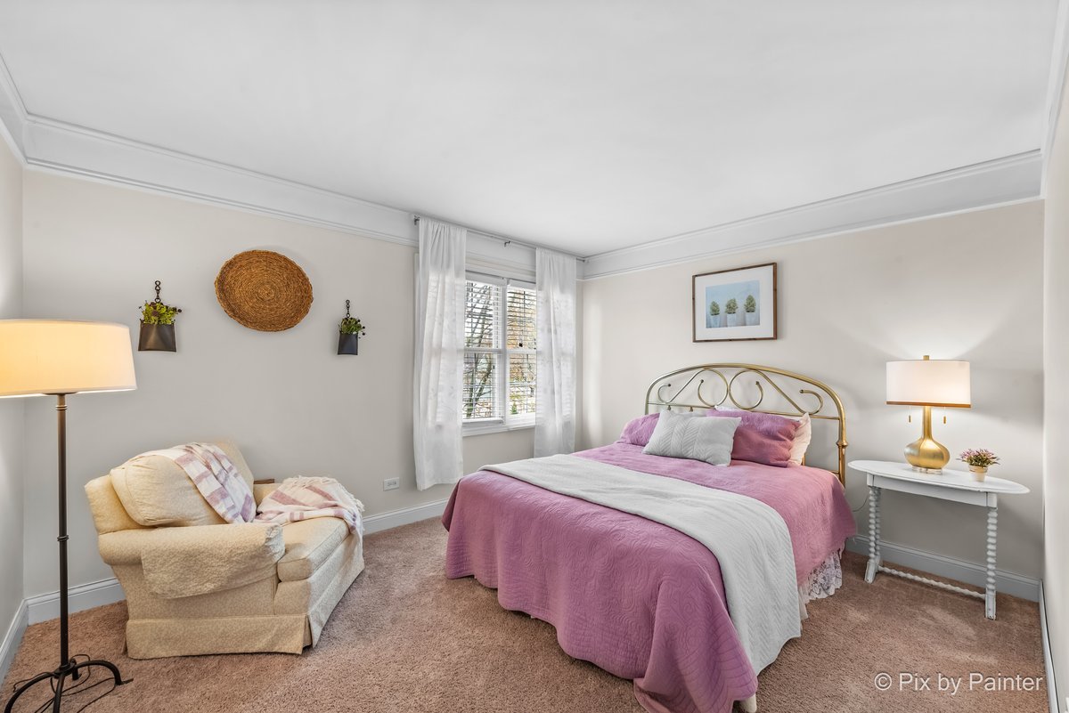 249 Adare Drive Cary, IL 60013 - Photo 32 of 36 a bedroom with bed and a lamp