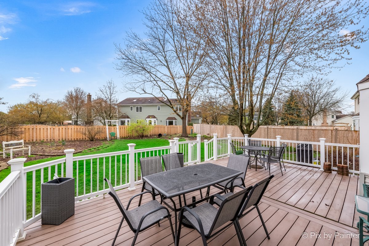 249 Adare Drive Cary, IL 60013 - Photo 5 of 36 a view of a deck with furniture and a yard