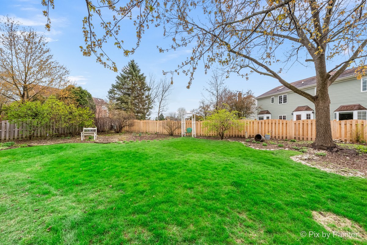 249 Adare Drive Cary, IL 60013 - Photo 7 of 36 a view of a house with backyard and garden