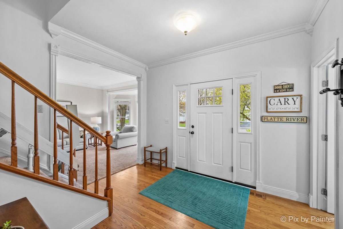 249 Adare Drive Cary, IL 60013 - Photo 9 of 36 a view of an entryway with wooden floor