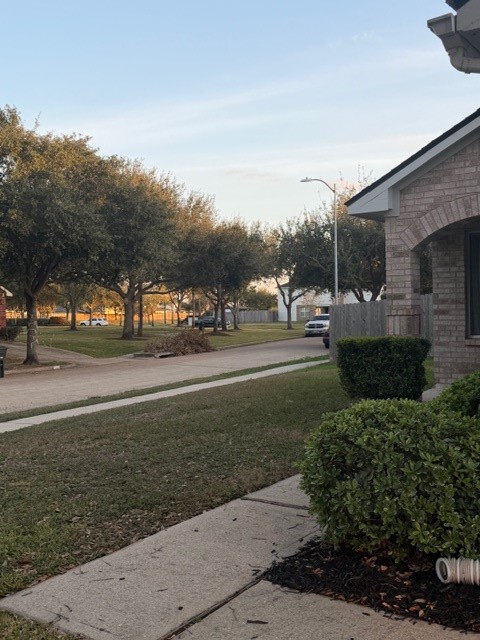 8626 Valley Crest Lane Houston, TX 77075 - Photo 2 of 14 a view of street with green space