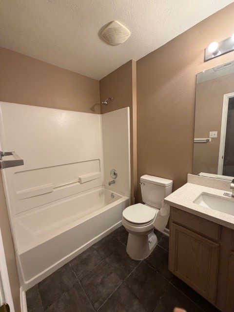 8626 Valley Crest Lane Houston, TX 77075 - Photo 7 of 14 a bathroom with a toilet a sink and bathtub