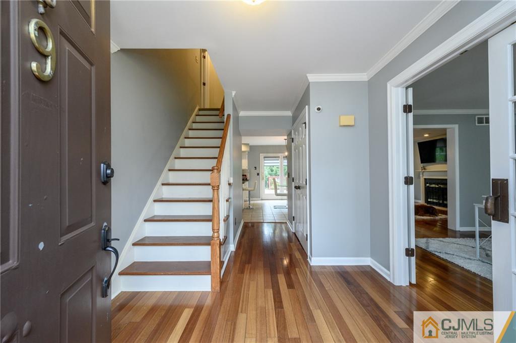 9 Pebble Beach Way Washington, NJ 07882 - Photo 2 of 42 a view of entryway with wooden floor
