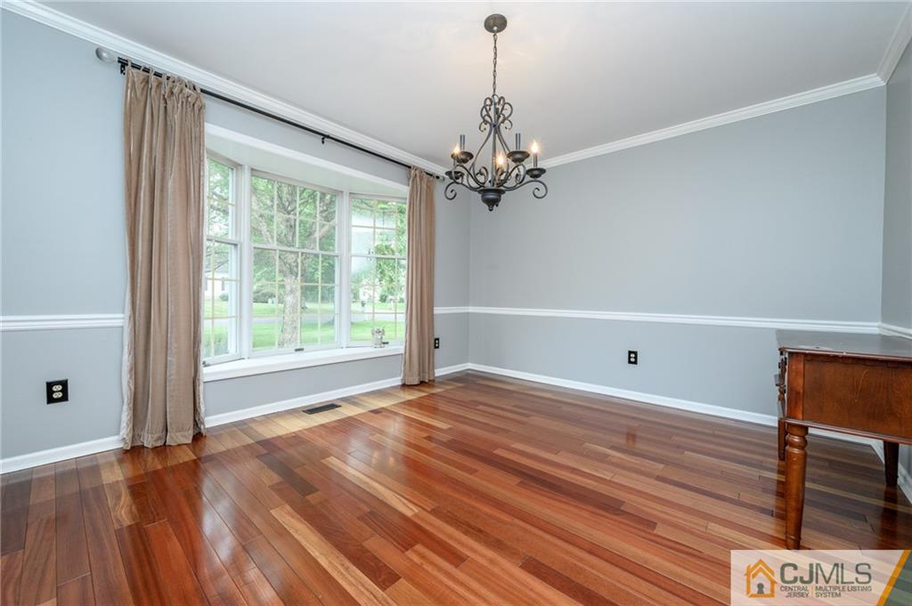 9 Pebble Beach Way Washington, NJ 07882 - Photo 4 of 42 a view of a livingroom with a chandelier