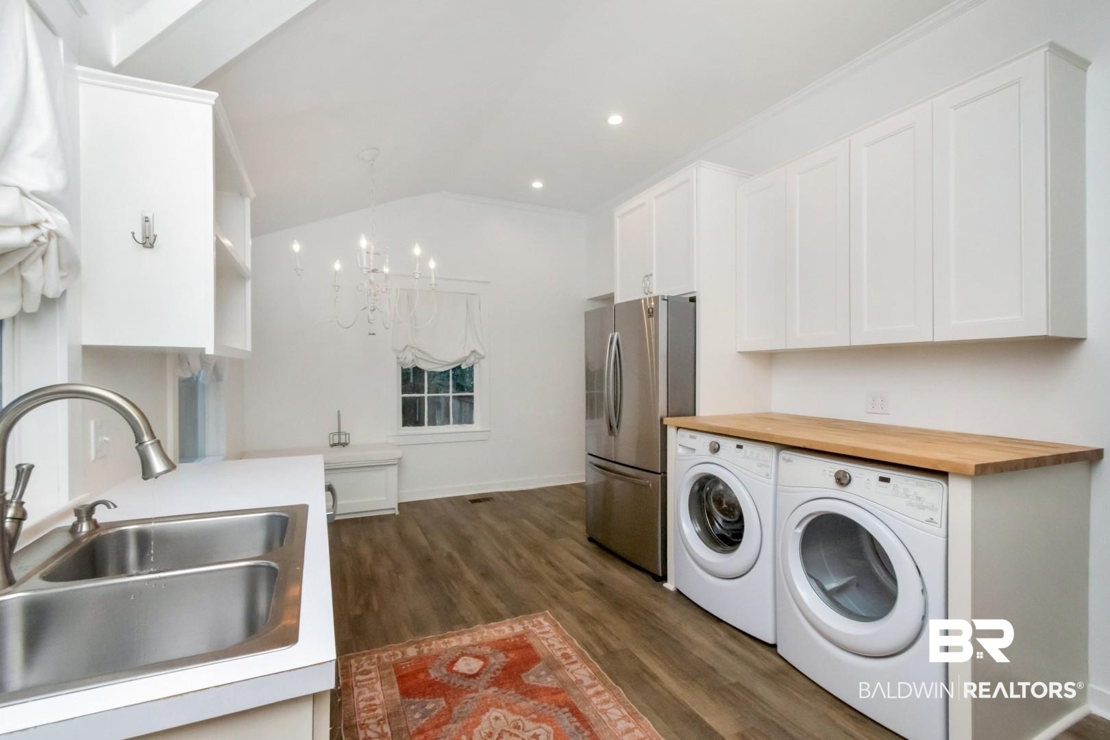 16 Princess Anne Road Mobile, AL 36608 - Photo 27 of 40 Laundry room with dark wood finished floors, vaulted ceiling, independent washer and dryer, a chandelier, and recessed lighting