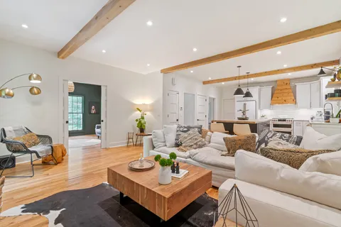 a bedroom with bed and a window